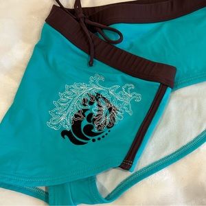Axcelerate by Speedo Swim Bottom. Brown, Turquoise.  Size: XL.